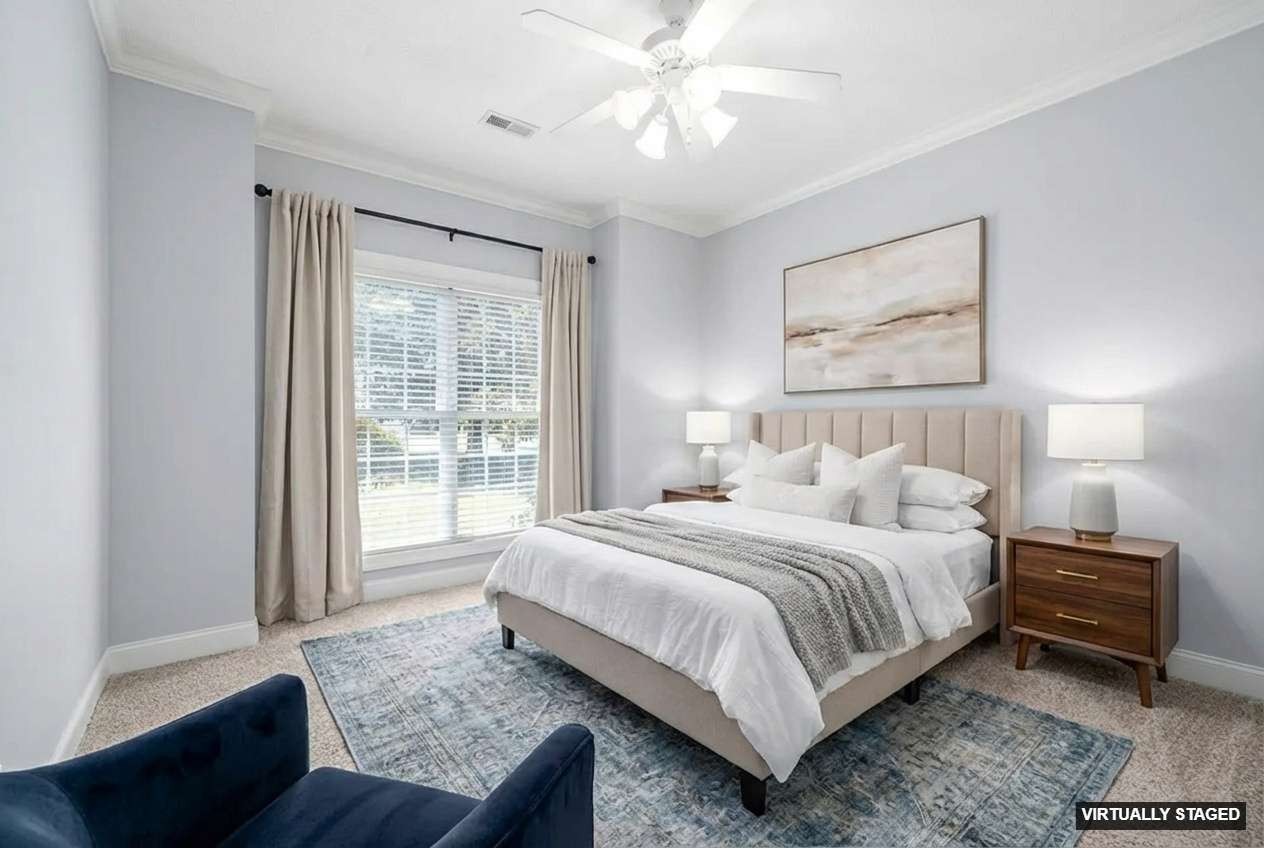 245 Cullom Way Clarksville, TN 37043 - Photo 38 of 74 a bedroom with a bed painting on wall and a large window