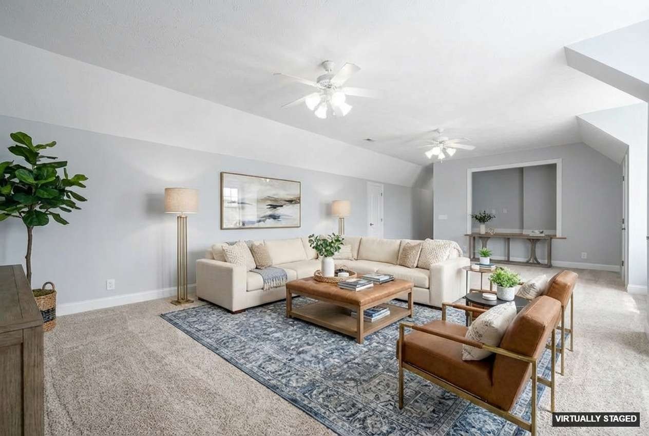 245 Cullom Way Clarksville, TN 37043 - Photo 43 of 74 a living room with furniture and a chandelier
