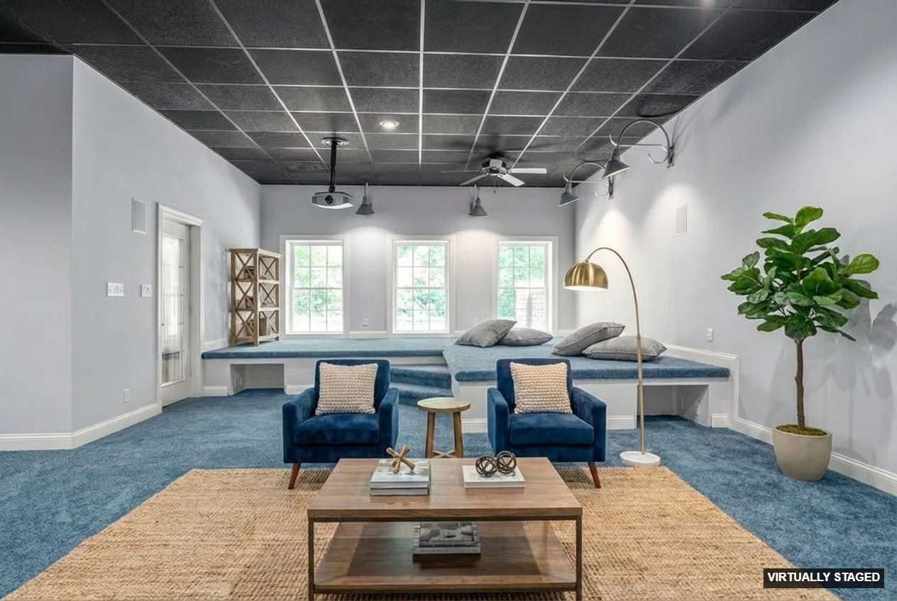 245 Cullom Way Clarksville, TN 37043 - Photo 51 of 74 a living room with furniture a chandelier and a potted plant