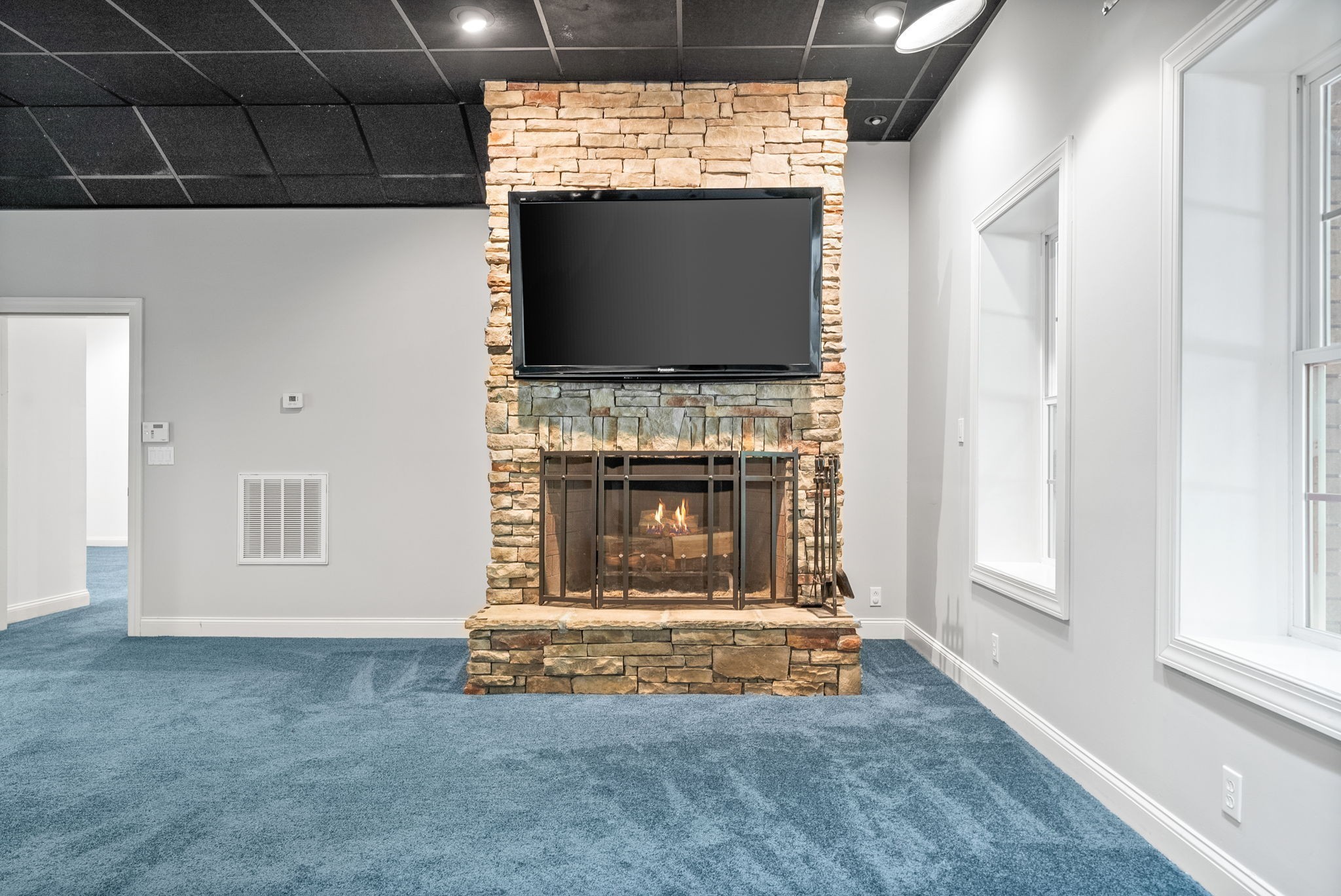245 Cullom Way Clarksville, TN 37043 - Photo 52 of 74 a living room with fireplace furniture and a flat screen tv