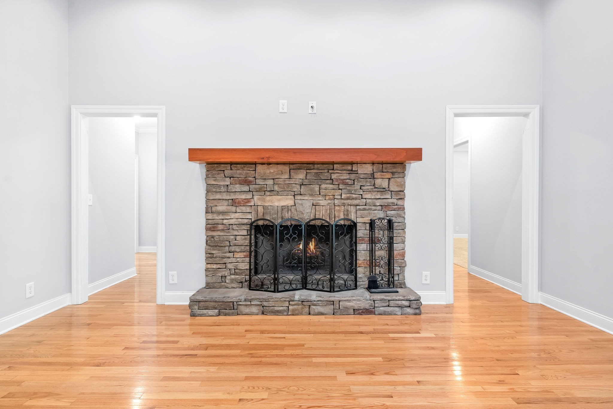 245 Cullom Way Clarksville, TN 37043 - Photo 7 of 74 a view of a livingroom with a fireplace a fireplace and wooden floor