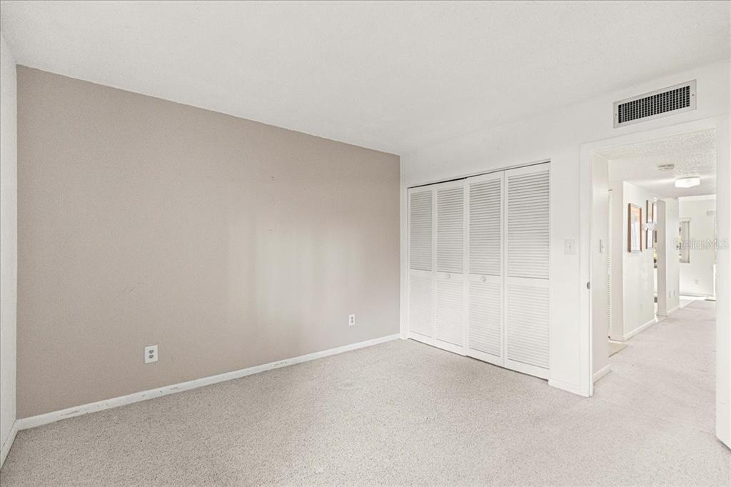 584 Fairways Circle, Unit A Ocala, FL 34472 - Photo 16 of 41 an empty room with a empty space