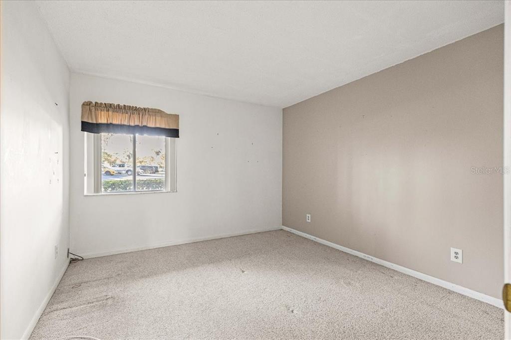 584 Fairways Circle, Unit A Ocala, FL 34472 - Photo 18 of 41 an empty room with a window