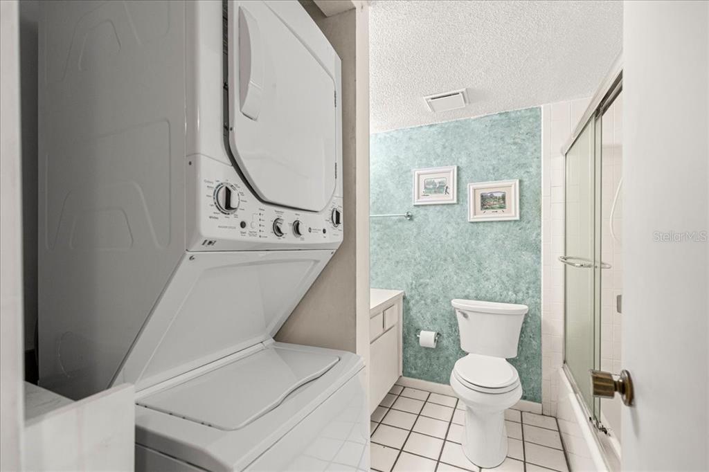 584 Fairways Circle, Unit A Ocala, FL 34472 - Photo 20 of 41 a white toilet sitting next to a bathroom sink