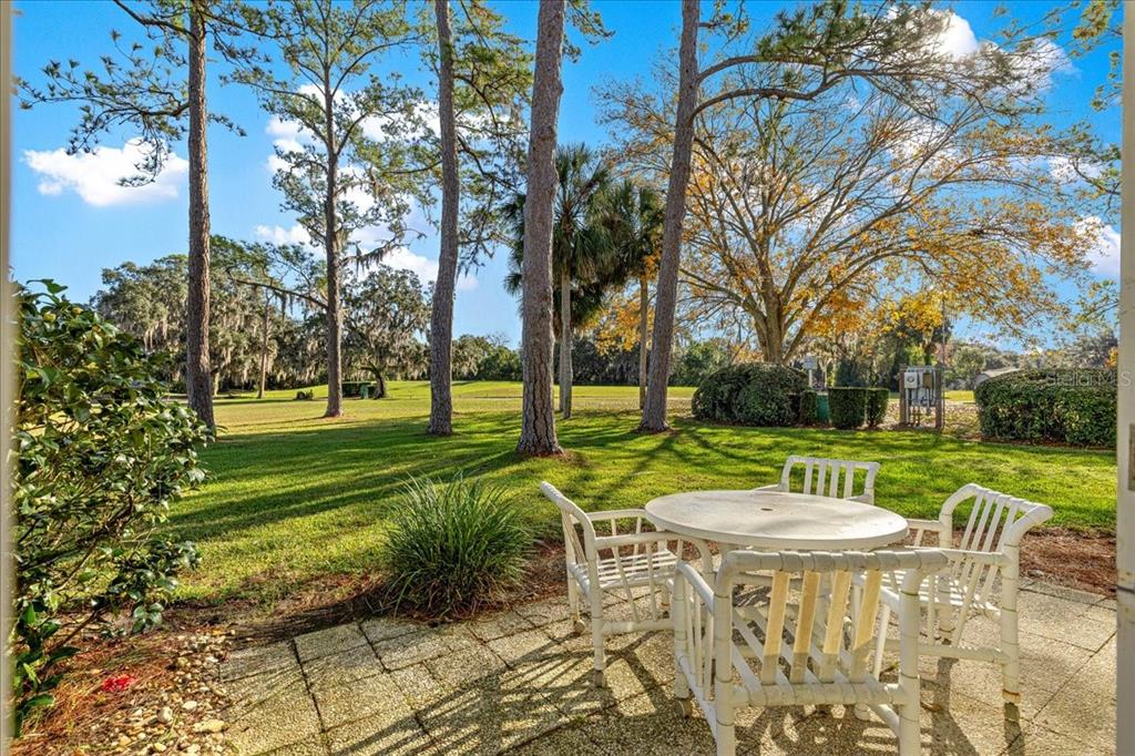 584 Fairways Circle, Unit A Ocala, FL 34472 - Photo 2 of 41 a view of a park with slide and a table