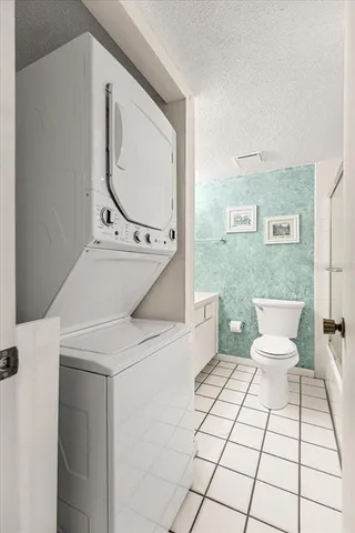 a bathroom with a glass shower door and mirror
