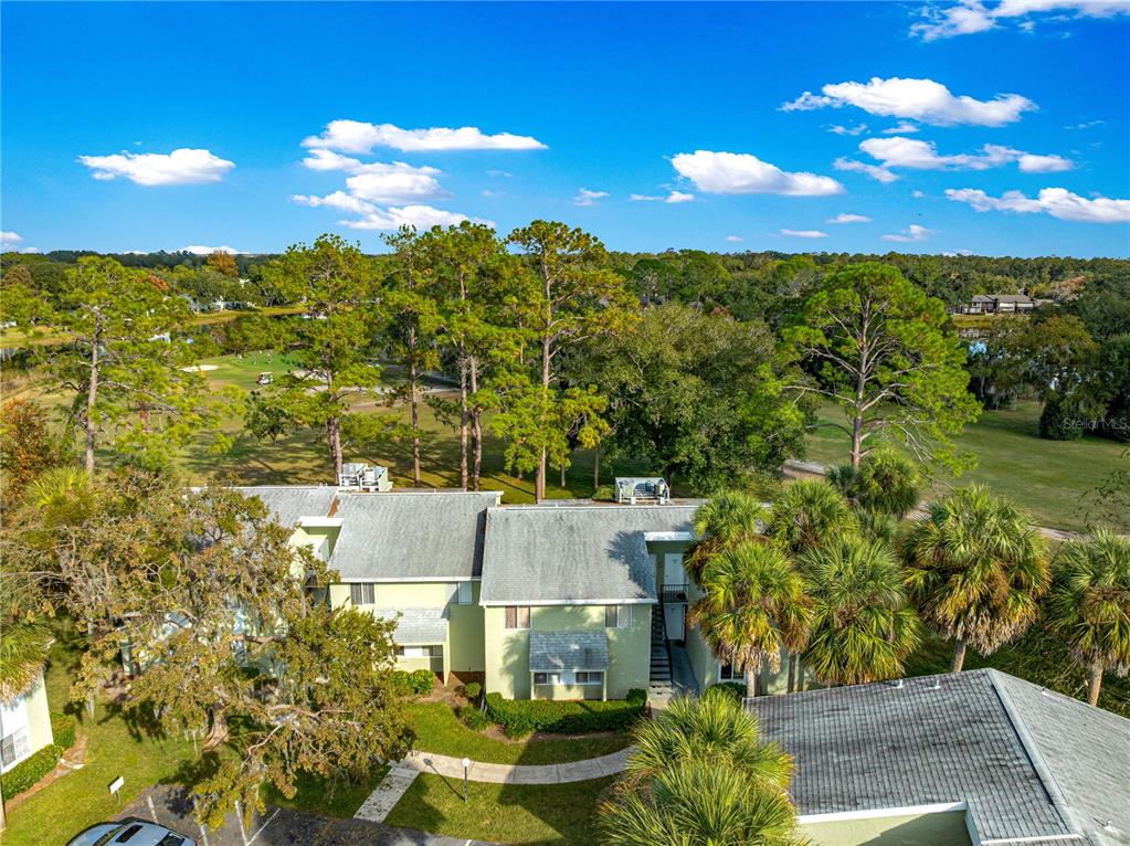 584 Fairways Circle, Unit A Ocala, FL 34472 - Photo 25 of 41 a view of an outdoor space and a yard