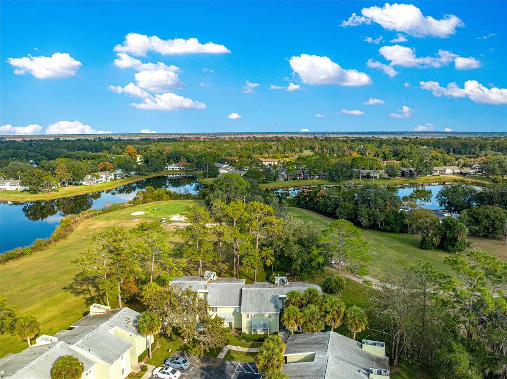 584 Fairways Circle, Unit A Ocala, FL 34472 - Photo 27 of 41 a view of a city with lots of residential buildings ocean and mountain view in back