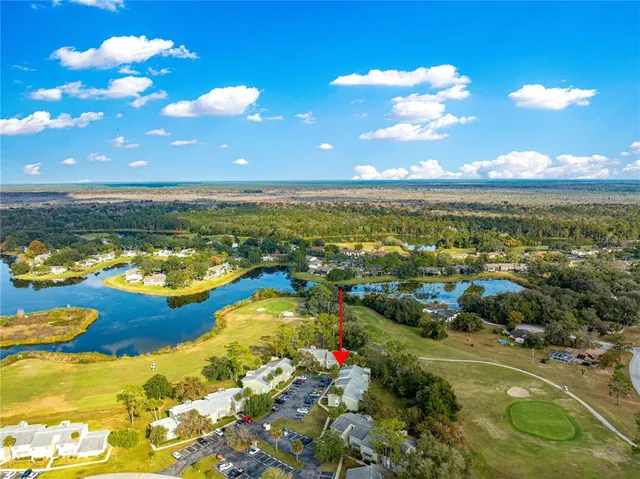 a view of an ocean and a yard