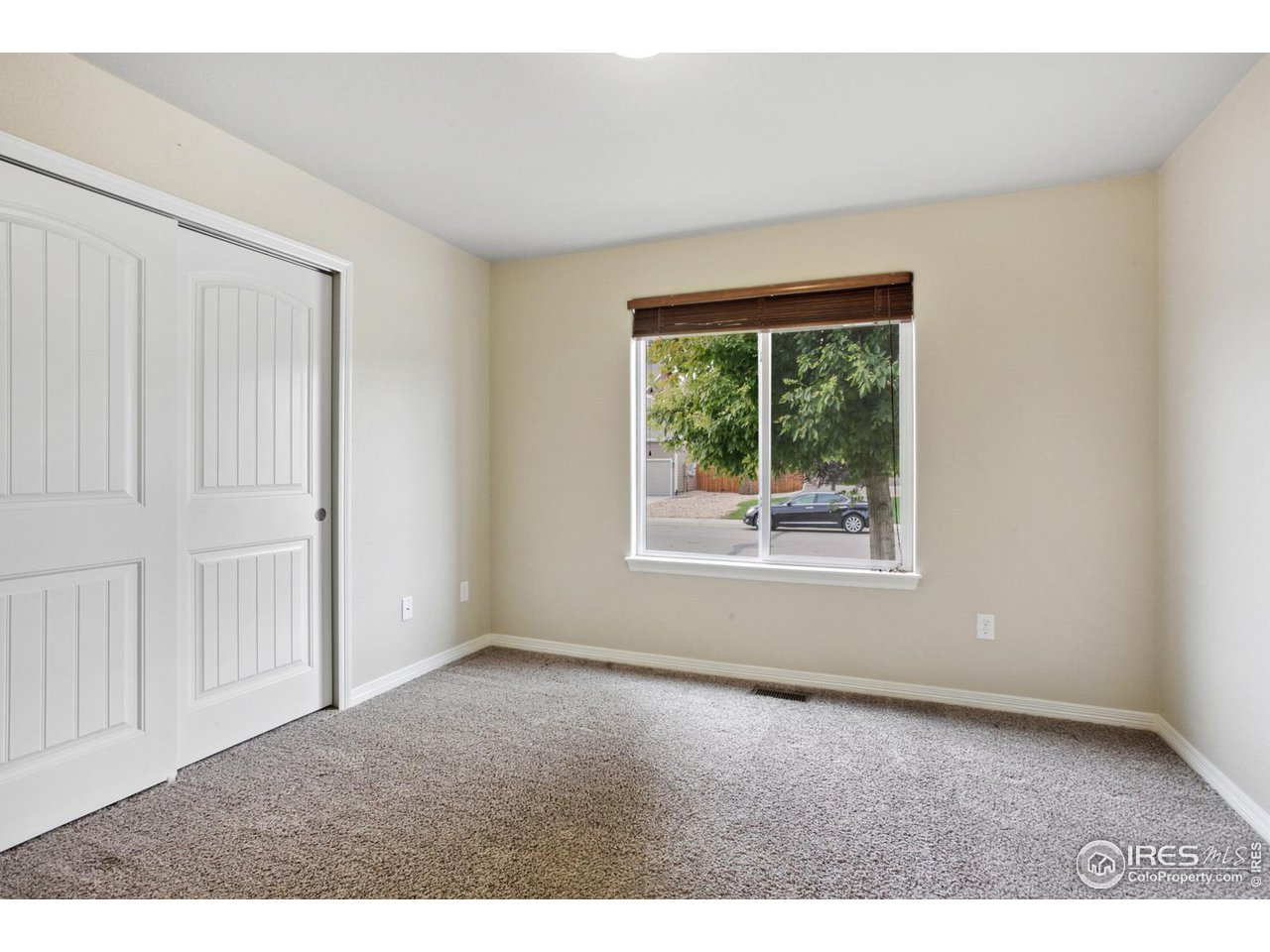 9018 Sandpiper Drive Frederick, CO 80504 - Photo 20 of 26 an empty room with windows