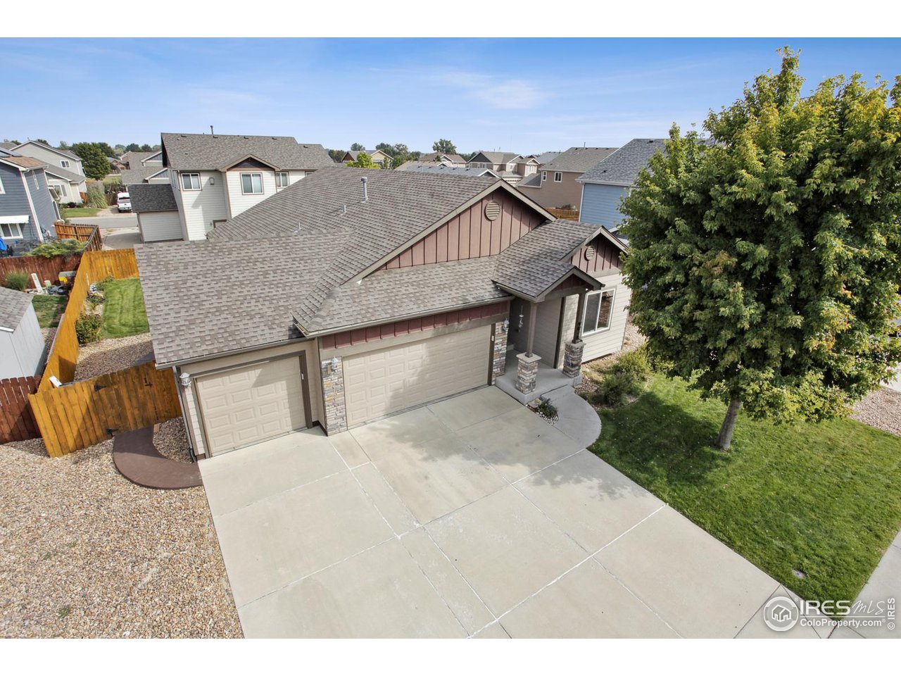 9018 Sandpiper Drive Frederick, CO 80504 - Photo 2 of 26 a view of a house with a yard