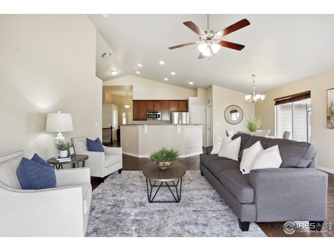 9018 Sandpiper Drive Frederick, CO 80504 - Photo 5 of 26 a living room with furniture