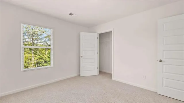 an empty room with windows