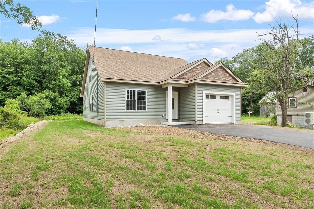 572 Pleasant Street Athol, MA 01331 - Photo 4 of 32 a house with a yard