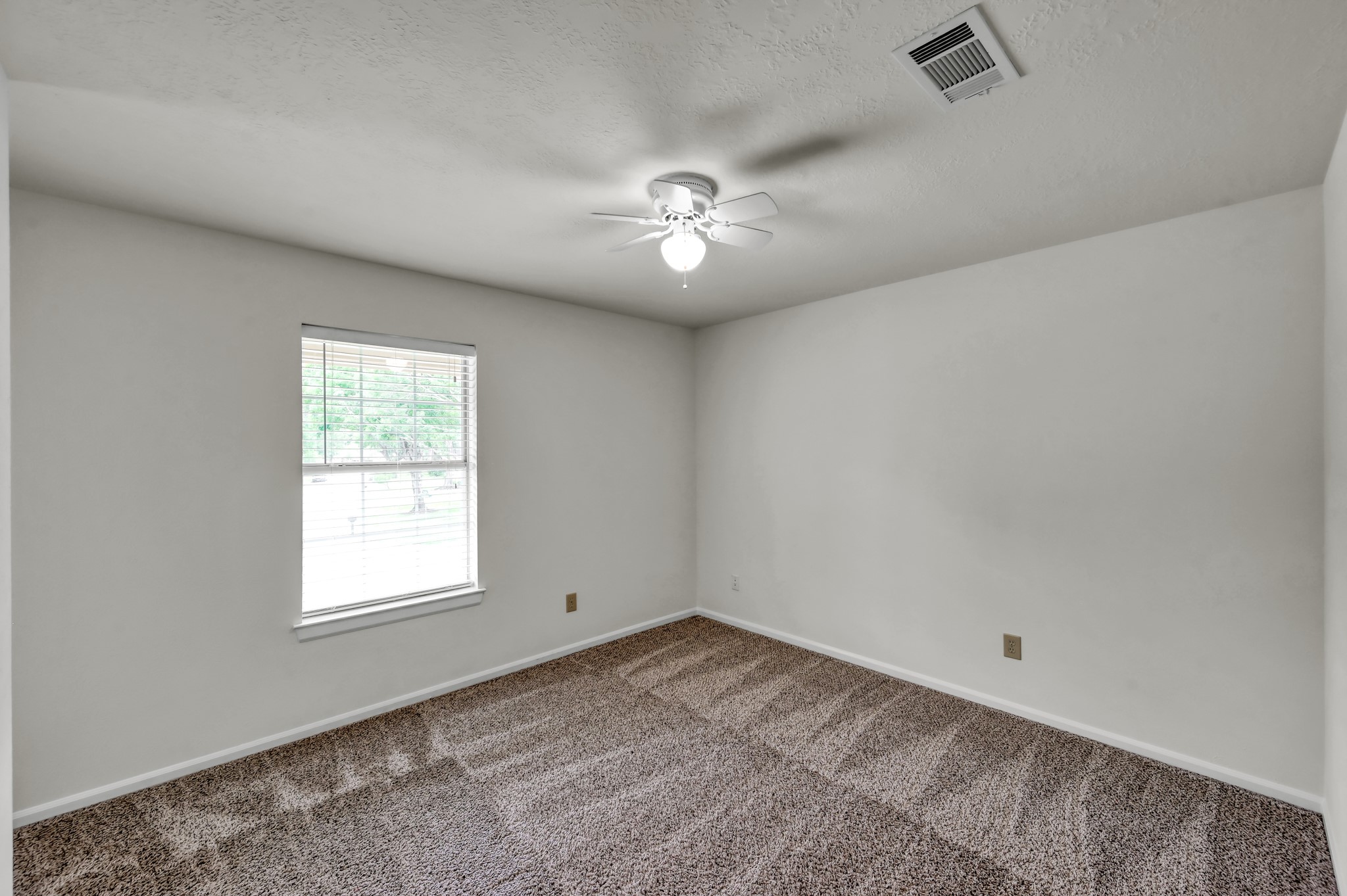 114 Regency Way Conroe, TX 77304 - Photo 30 of 48 Bedroom #2 of 5 adjacent to Primary bedroom. Great for home office or nursery.