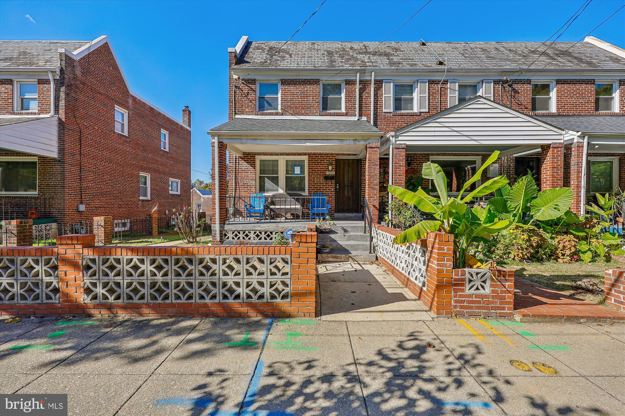 4808 Fort Totten Drive Northeast Washington, DC 20011 - Photo 1 of 30 a front view of a house with a garden