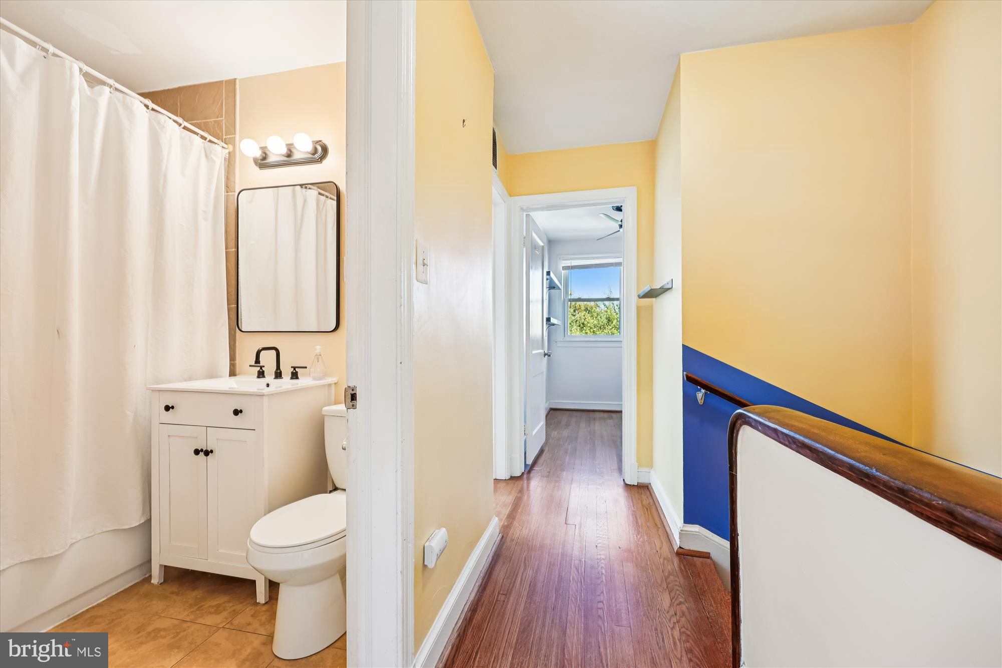 4808 Fort Totten Drive Northeast Washington, DC 20011 - Photo 13 of 30 a bathroom with a sink a toilet and shower