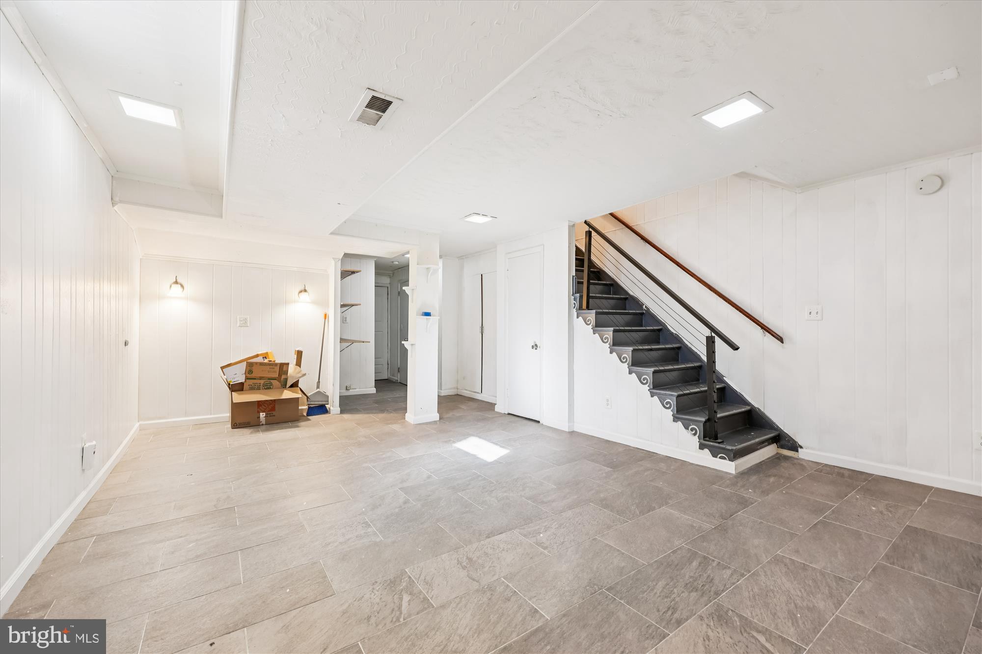 4808 Fort Totten Drive Northeast Washington, DC 20011 - Photo 23 of 30 a view of a livingroom with stairs and furniture