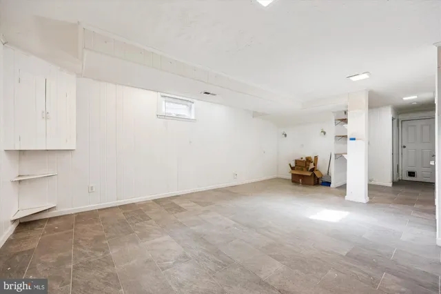 a bathroom with a sink a shower and a mirror