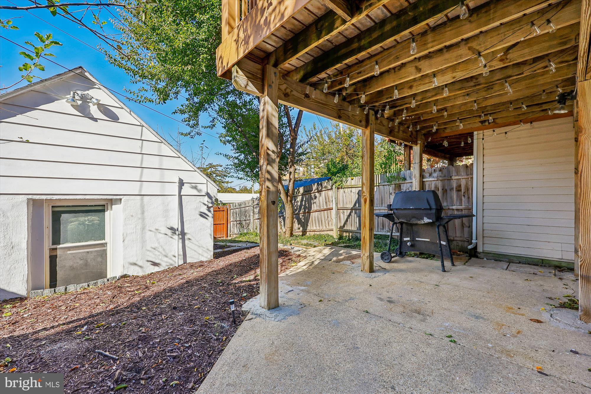 4808 Fort Totten Drive Northeast Washington, DC 20011 - Photo 28 of 30 a view of a house with backyard and sitting area