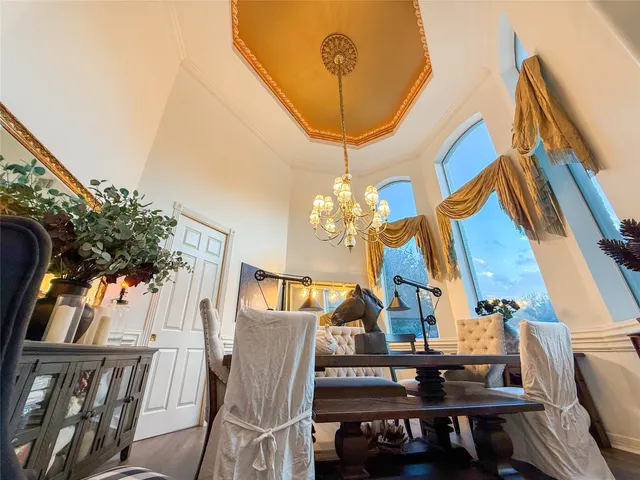 an aerial view of a house with yard swimming pool and outdoor seating