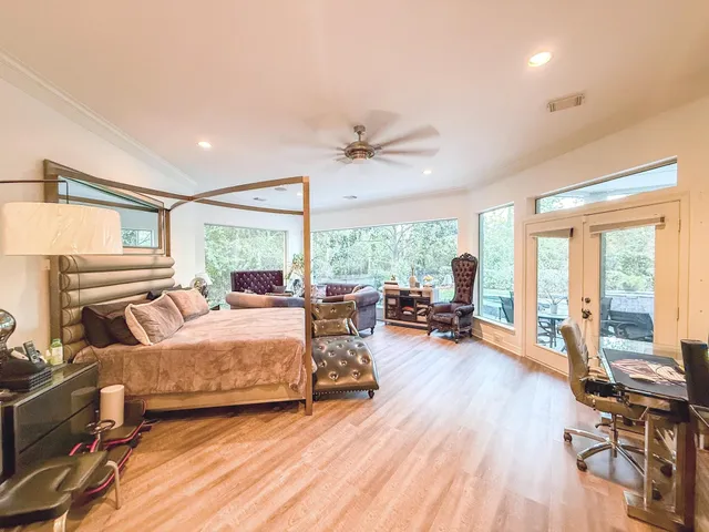 a view of a swimming pool with a patio