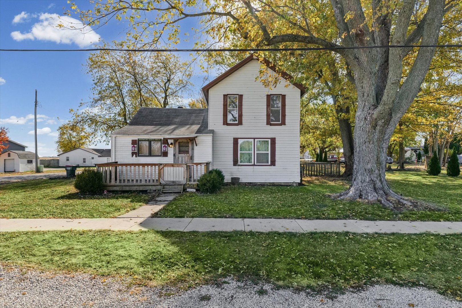 328 East Pera Street Ludlow, IL 60949 - Photo 2 of 29 a house that has a tree in front of a house