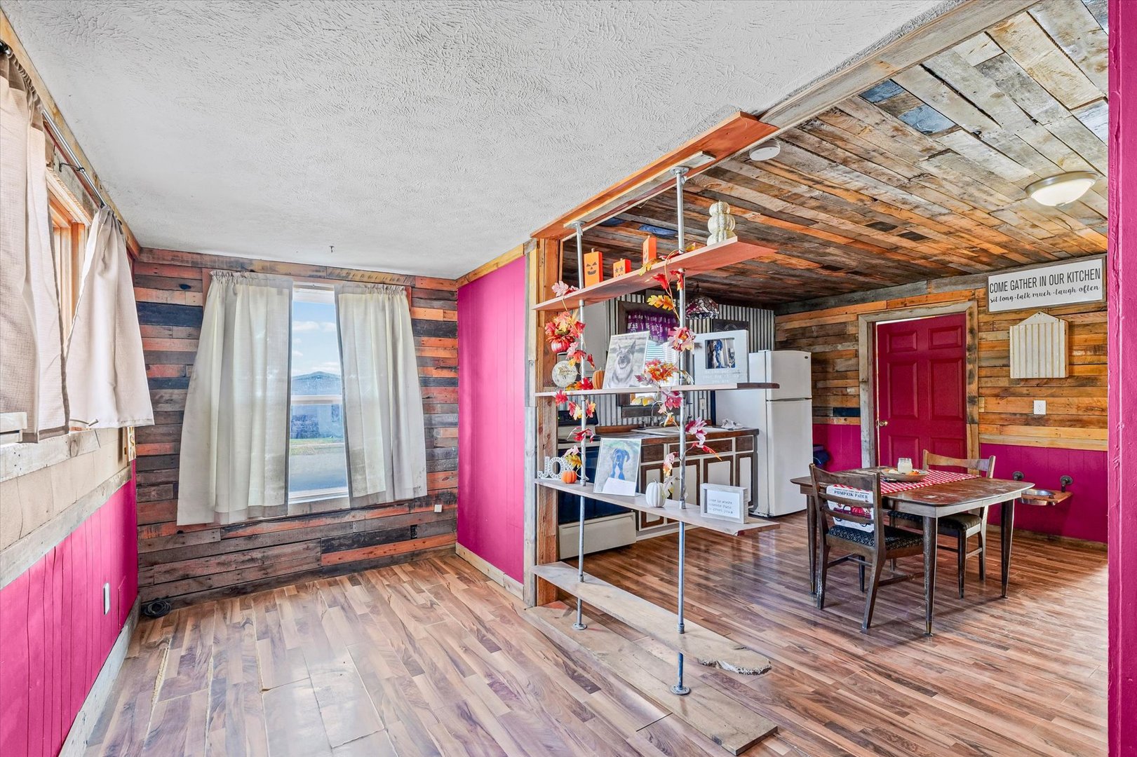 328 East Pera Street Ludlow, IL 60949 - Photo 4 of 29 a view of work space with wooden floor and windows