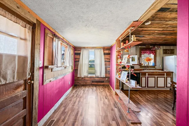 a view of entrance with a balcony