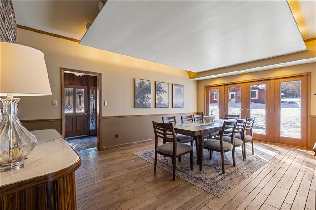 121 Brewer Road Saxonburg, PA 16056 - Photo 15 of 49 a view of a dining room with furniture window and wooden floor