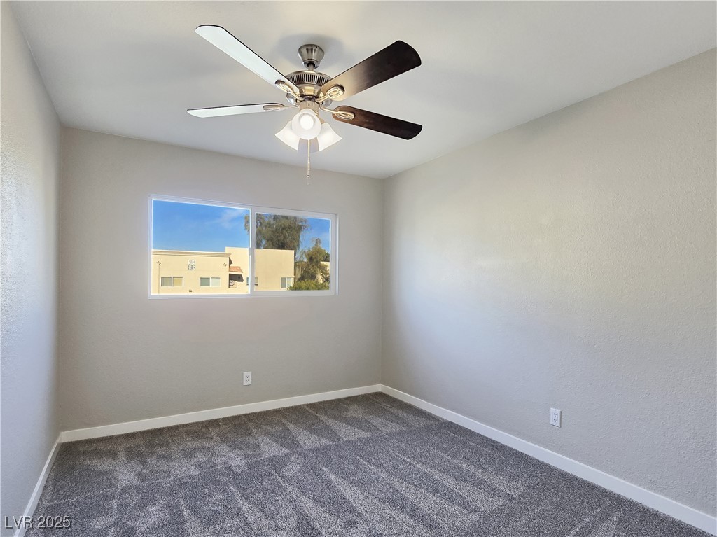 1812 North Decatur Boulevard, Unit 202 Las Vegas, NV 89108 - Photo 14 of 22 Generous Secondary Bedroom with Ceiling Fan