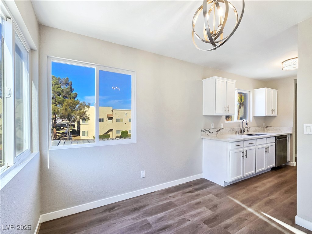 1812 North Decatur Boulevard, Unit 202 Las Vegas, NV 89108 - Photo 6 of 22 Fresh Two-Tone Interior Paint with upgraded Baseboards