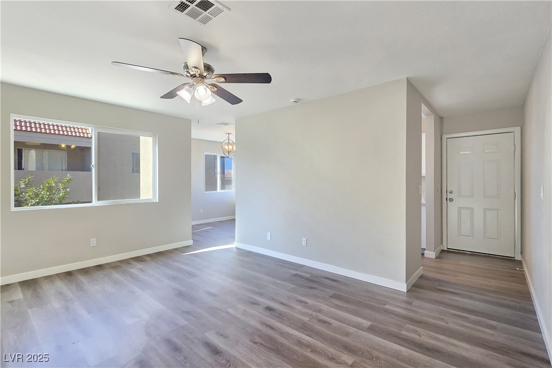1812 North Decatur Boulevard, Unit 202 Las Vegas, NV 89108 - Photo 8 of 22 New Luxury Vinyl Plank Flooring and New Carpet in Bedrooms