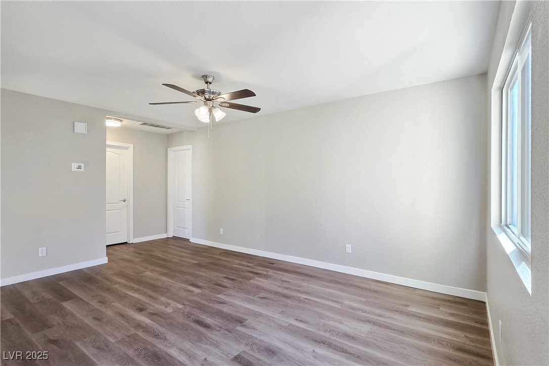 1812 North Decatur Boulevard, Unit 202 Las Vegas, NV 89108 - Photo 9 of 22 Great Room with Ceiling Fan