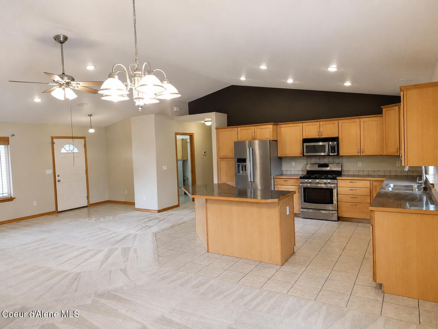 2104 West Evening Star Road Post Falls, ID 83854 - Photo 11 of 22 Kitchen and Living room and Dining room