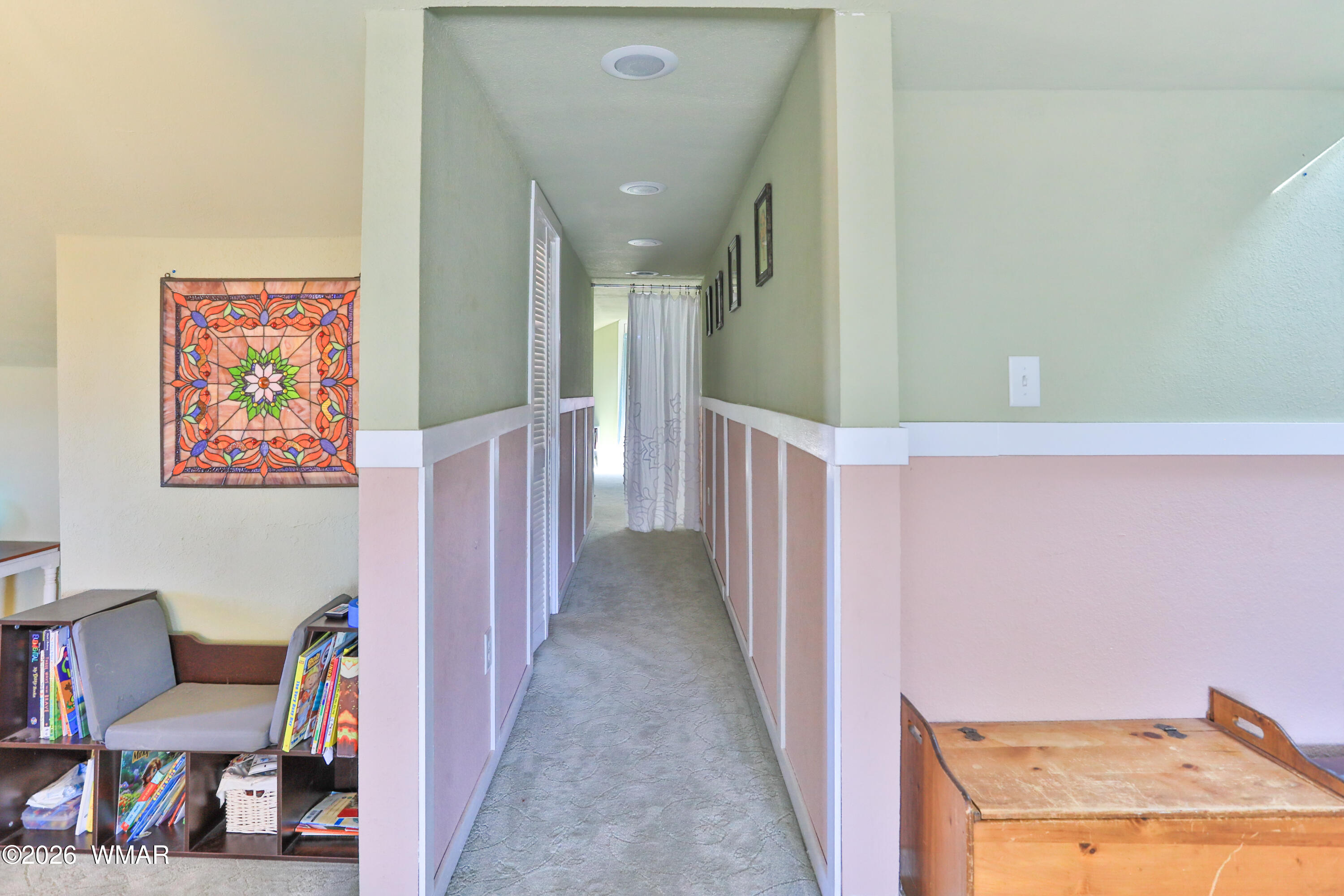 102 Crestview Road Holbrook, AZ 86025 - Photo 33 of 55 a view of a hallway with workspace and entryway
