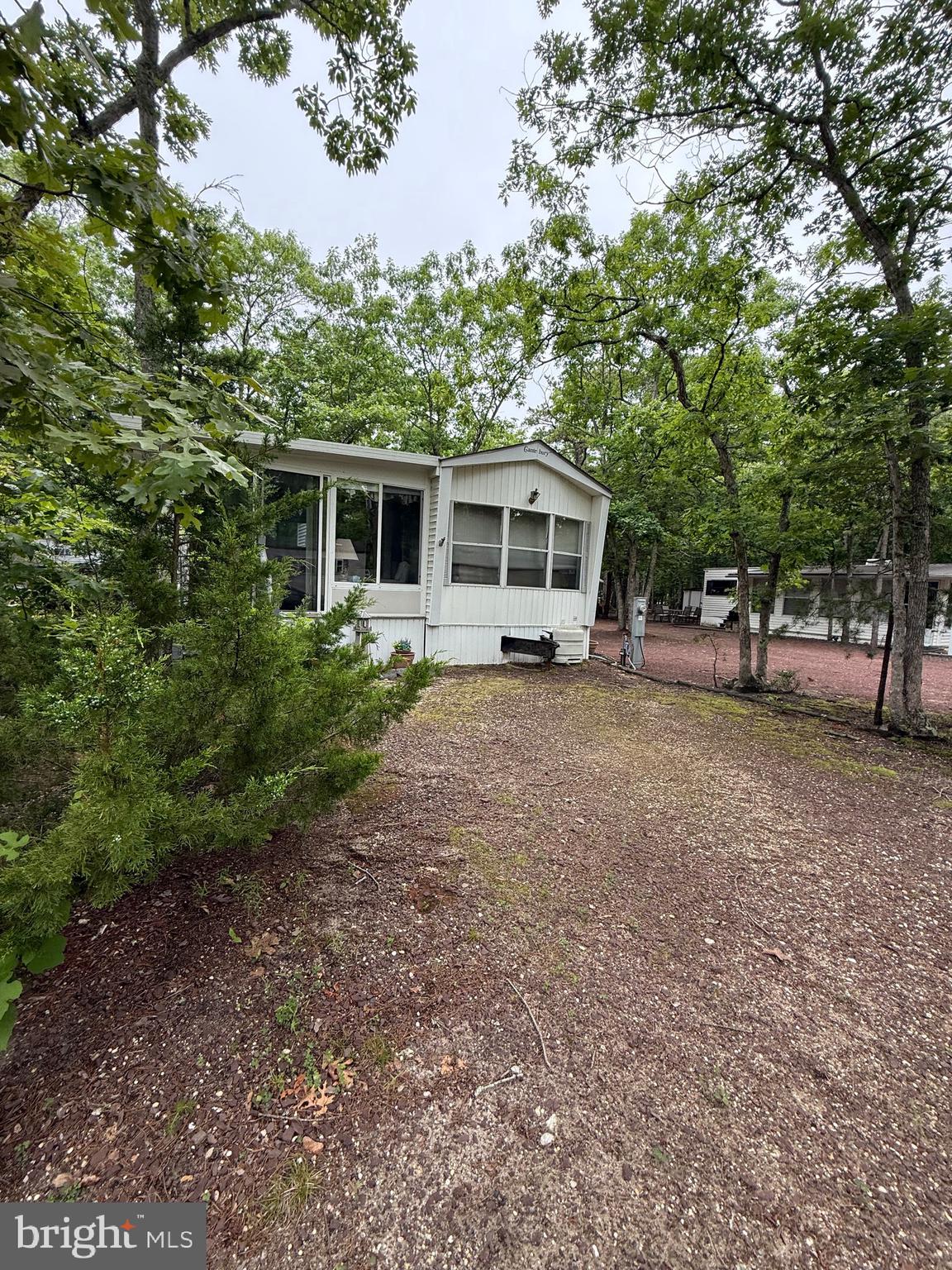 3066 Highway 9, Unit 196 Ocean View, NJ 08230 - Photo 2 of 8 a view of a house with a backyard