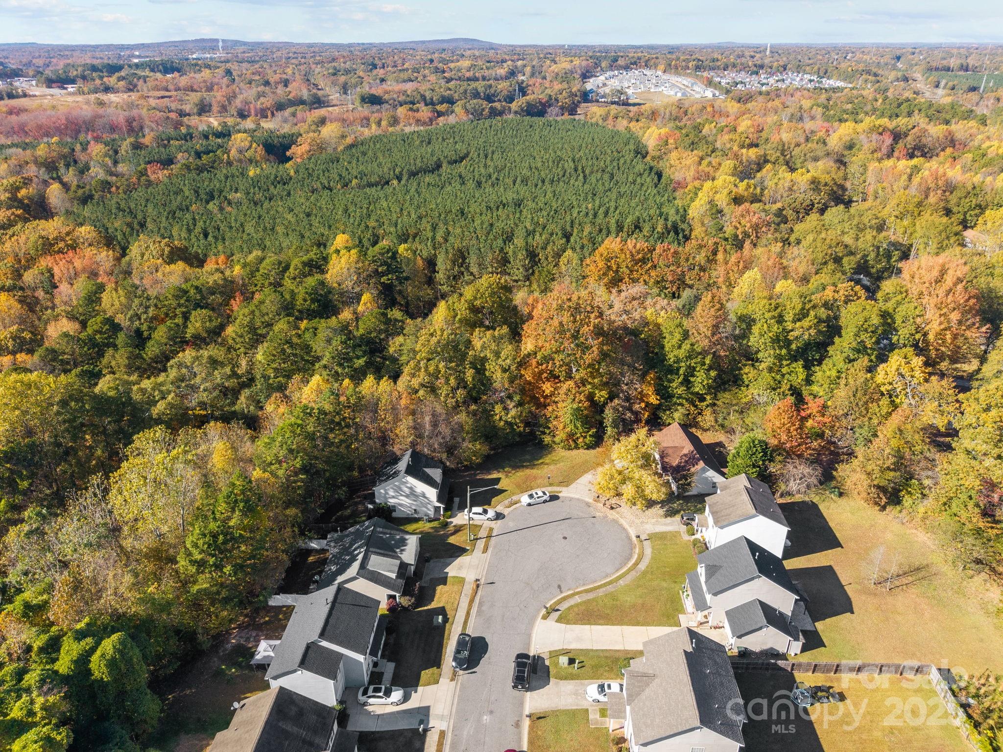 708 Raindrops Road Gastonia, NC 28054 - Photo 25 of 28 an aerial view of residential houses with outdoor space