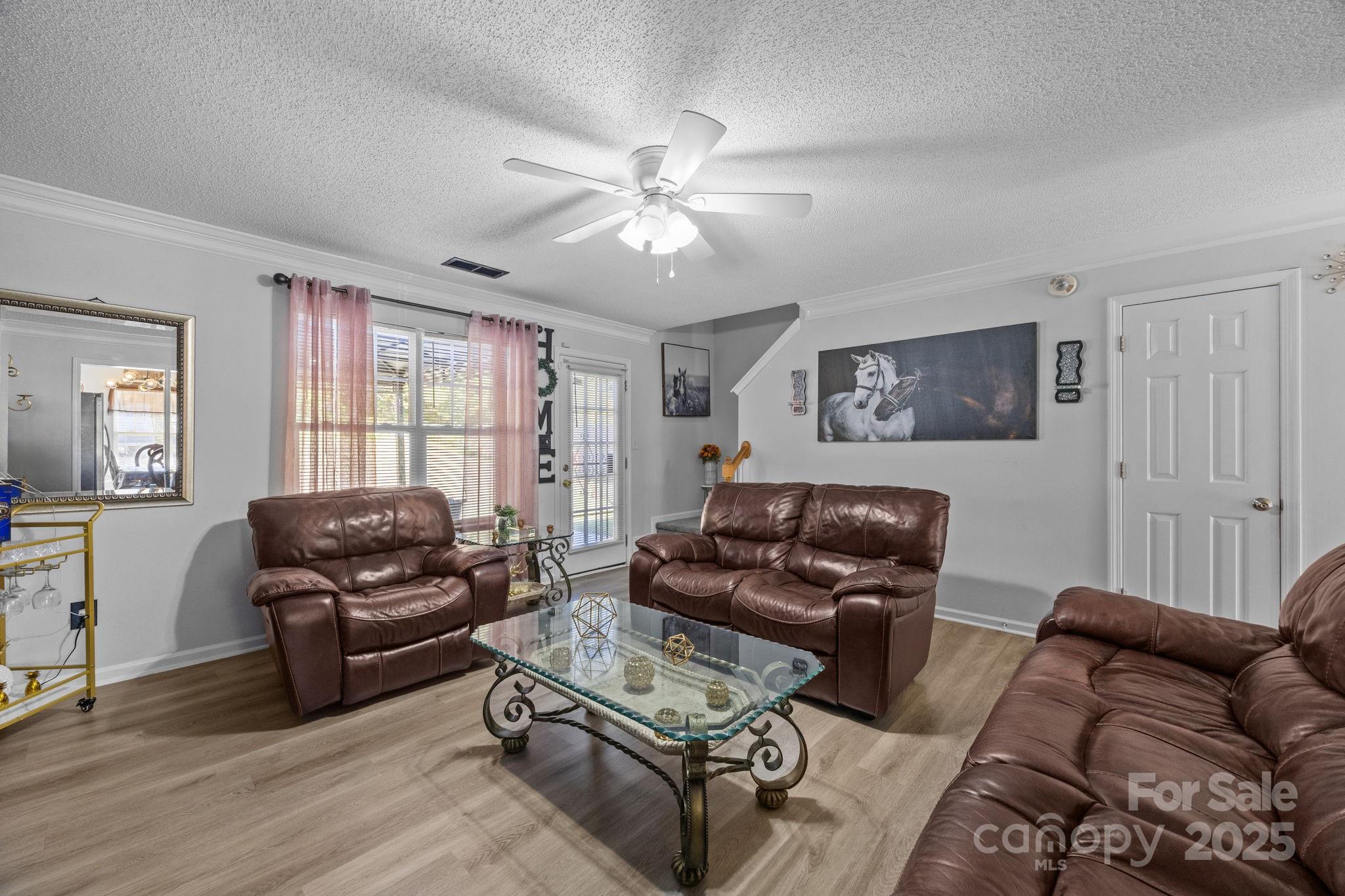708 Raindrops Road Gastonia, NC 28054 - Photo 4 of 28 a living room with furniture and a window