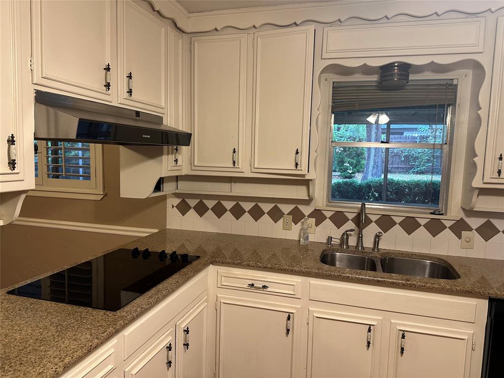 532 Plainview Drive Hurst, TX 76054 - Photo 40 of 40 a kitchen with a sink and cabinets