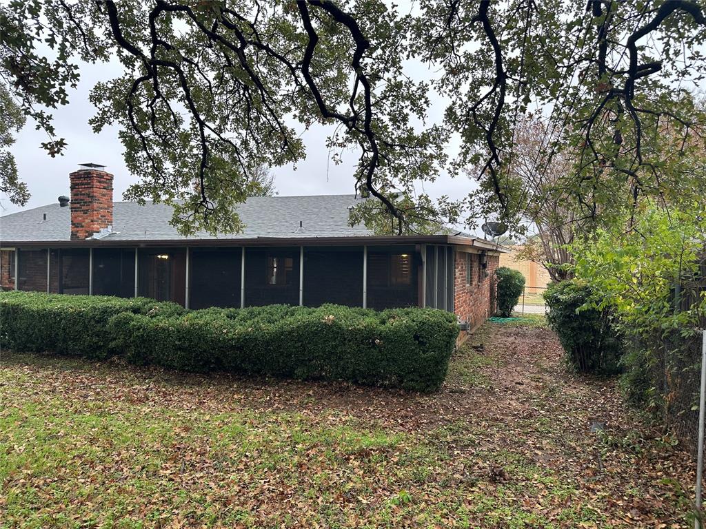 532 Plainview Drive Hurst, TX 76054 - Photo 8 of 40 a front view of a house with garden