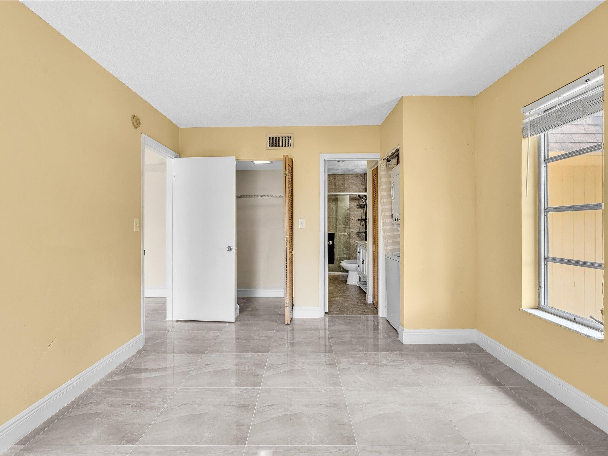 470 Northwest 20th Street, Unit 3020 Boca Raton, FL 33431 - Photo 16 of 43 Primary Suite