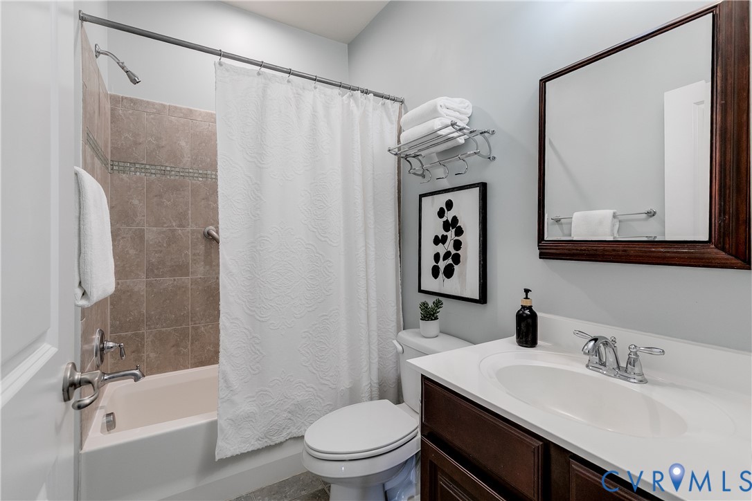 7538 South Franklins Way Quinton, VA 23141 - Photo 32 of 48 a bathroom with a sink a toilet and shower