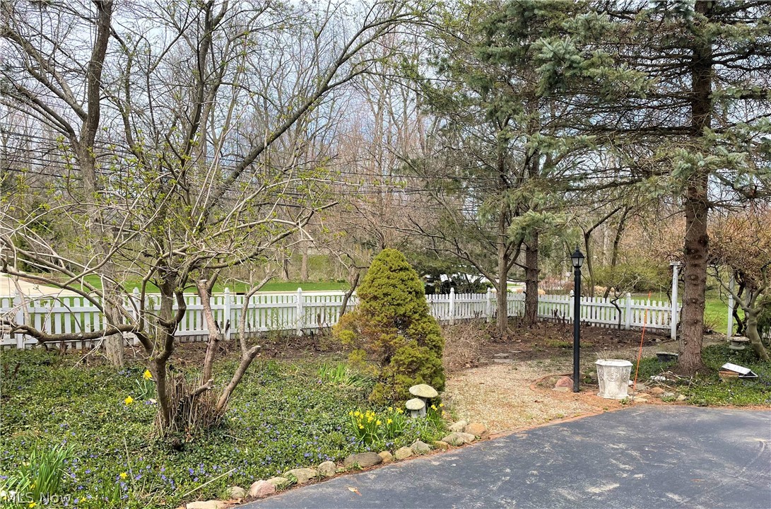 3261 Lander Road Pepper Pike, OH 44124 - Photo 35 of 35 White picket fence surrounds front garden area.