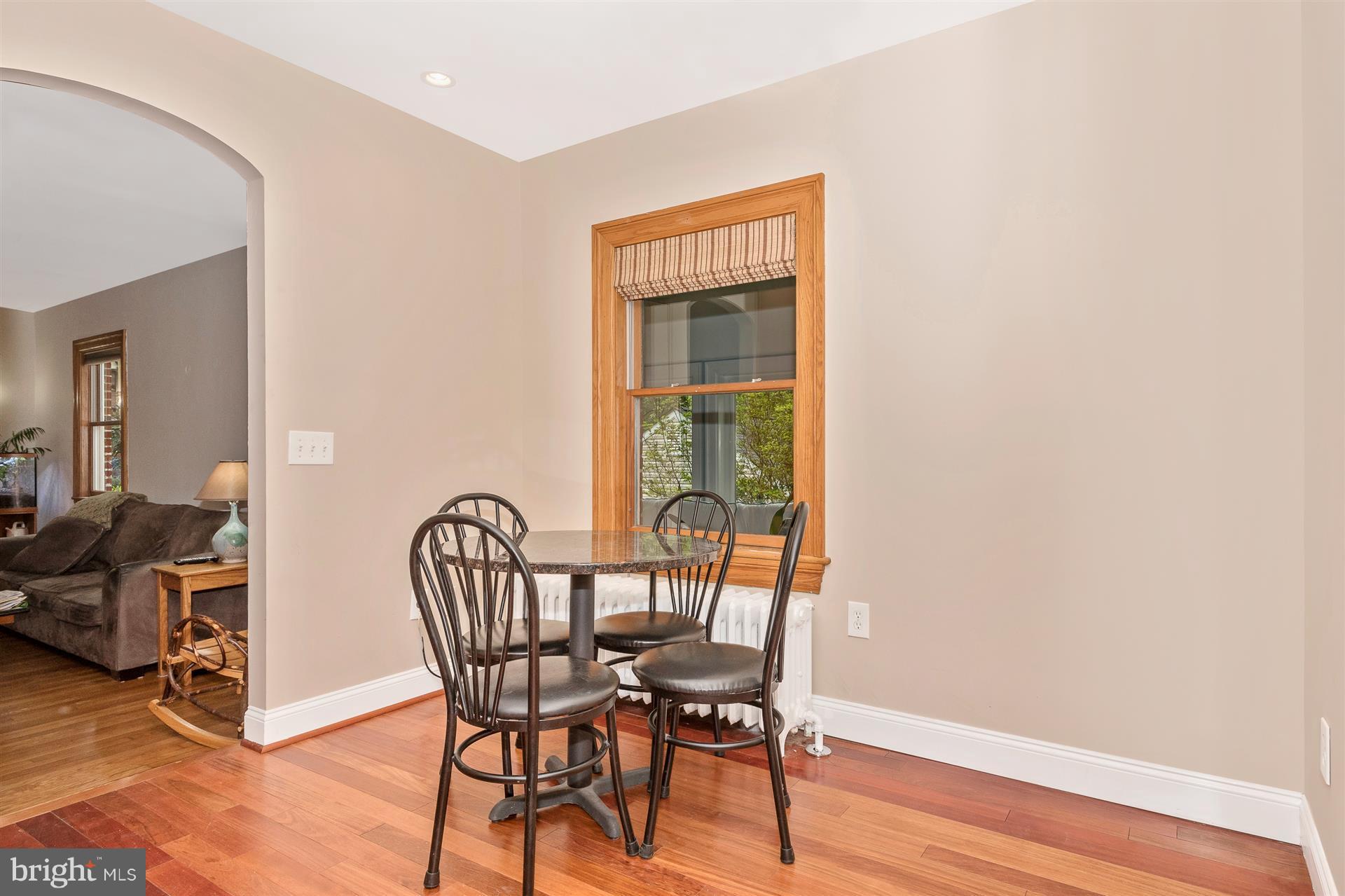 107 Sunnyside Road Silver Spring, MD 20910 - Photo 11 of 26 a view of a room with furniture and wooden floor