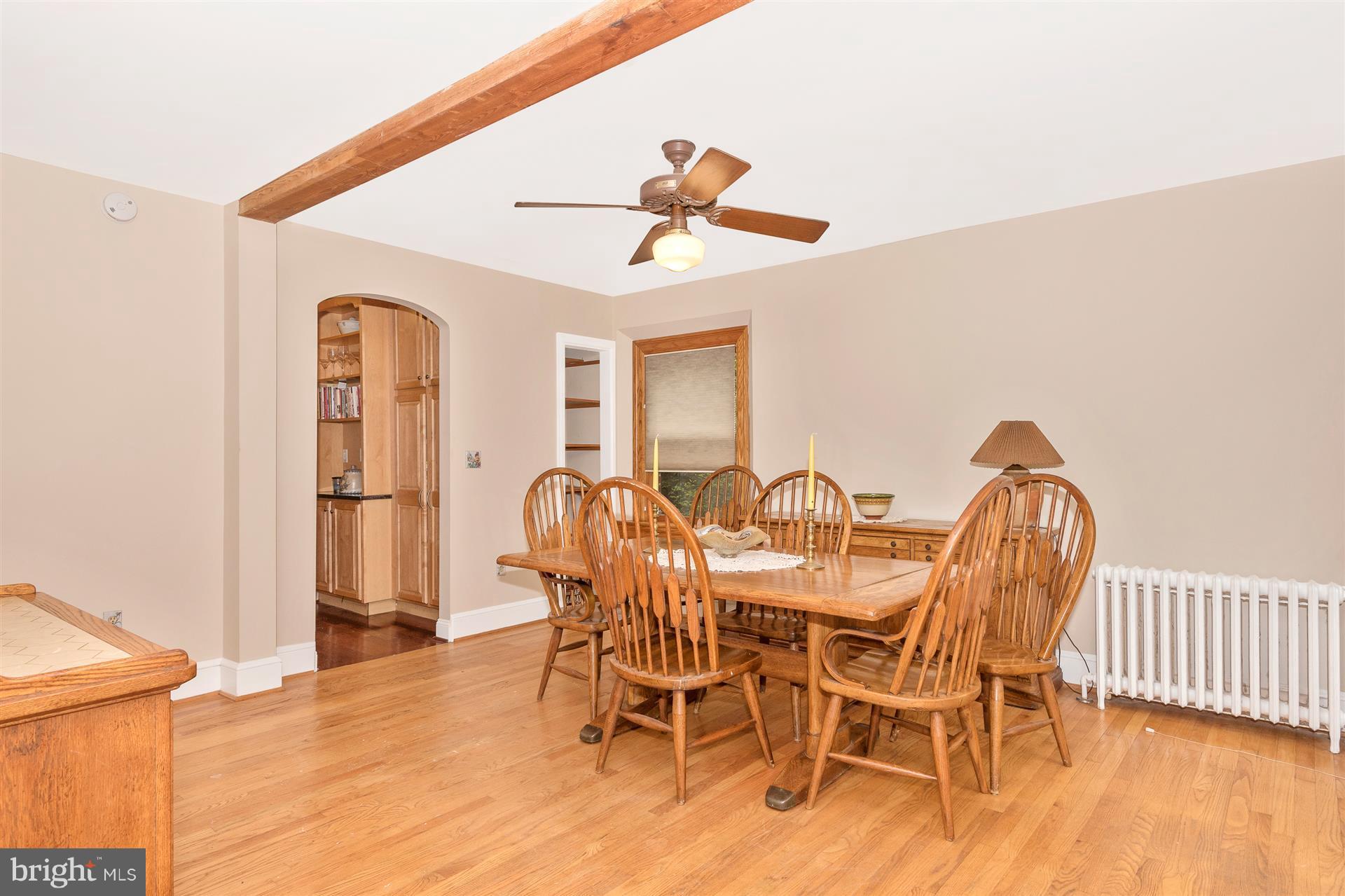 107 Sunnyside Road Silver Spring, MD 20910 - Photo 14 of 26 a view of a dining room with furniture and wooden floor