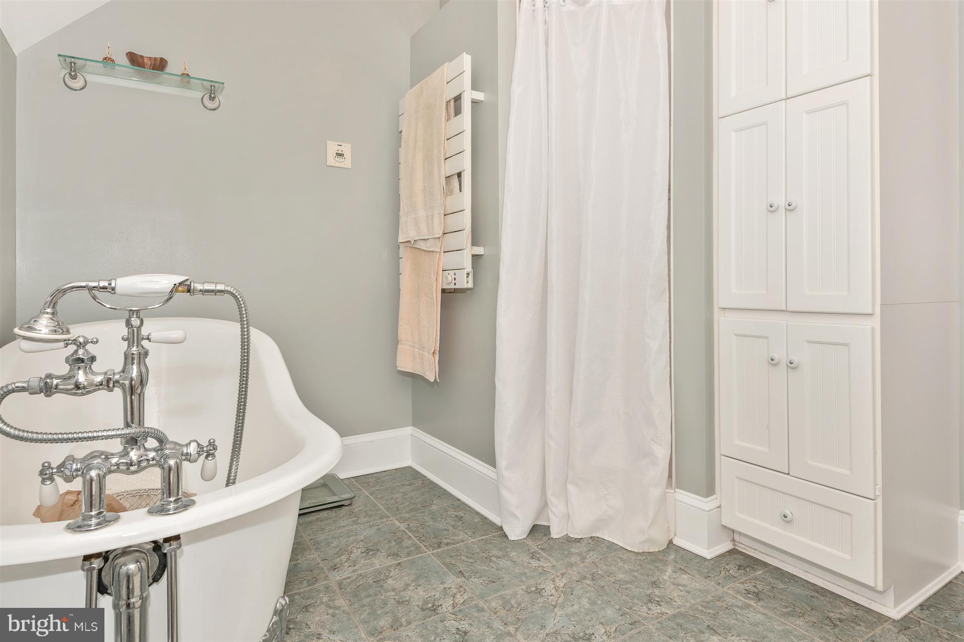 107 Sunnyside Road Silver Spring, MD 20910 - Photo 20 of 26 a bathroom with a sink and a mirror
