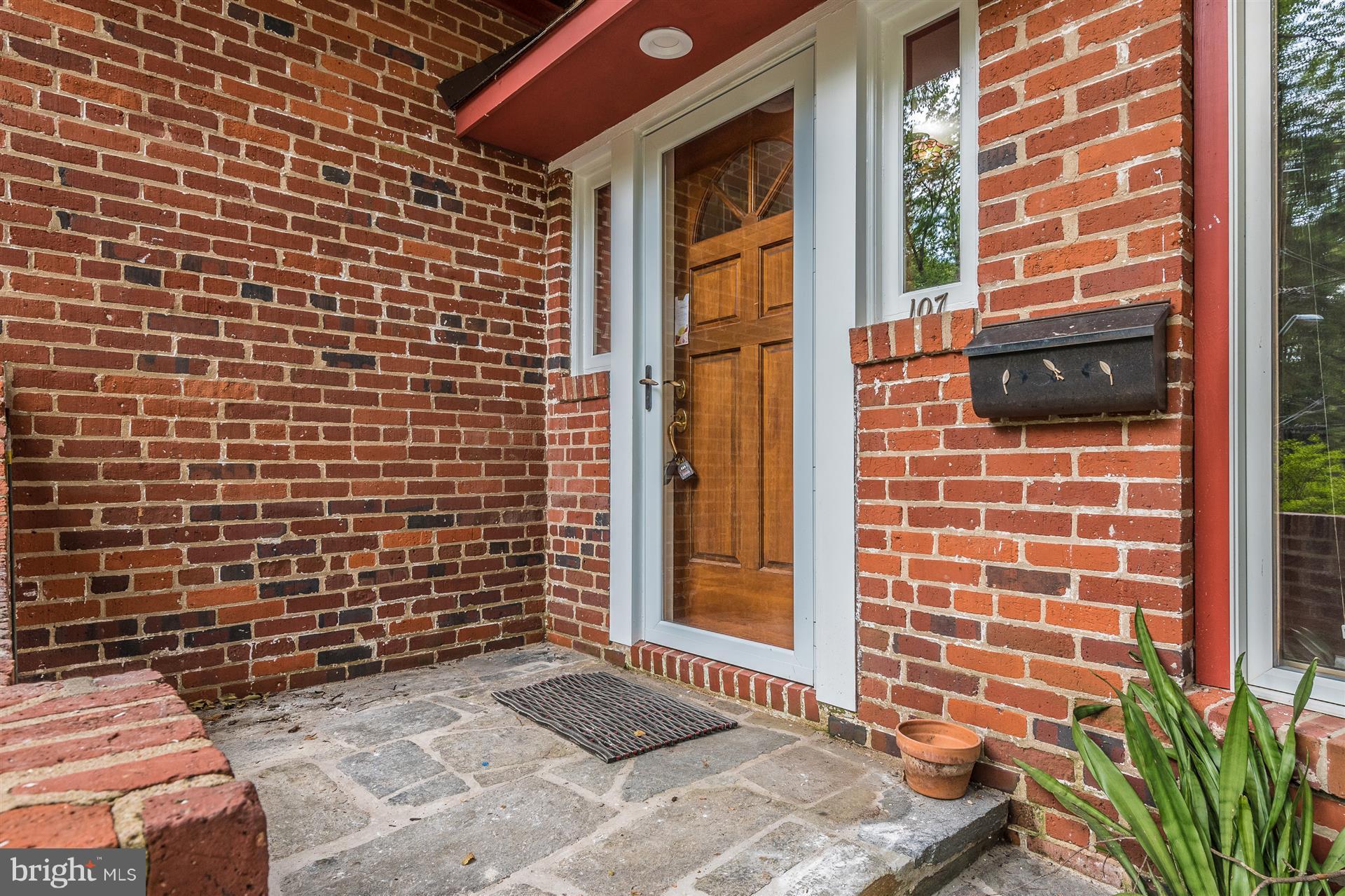 107 Sunnyside Road Silver Spring, MD 20910 - Photo 3 of 26 a view of a brick wall