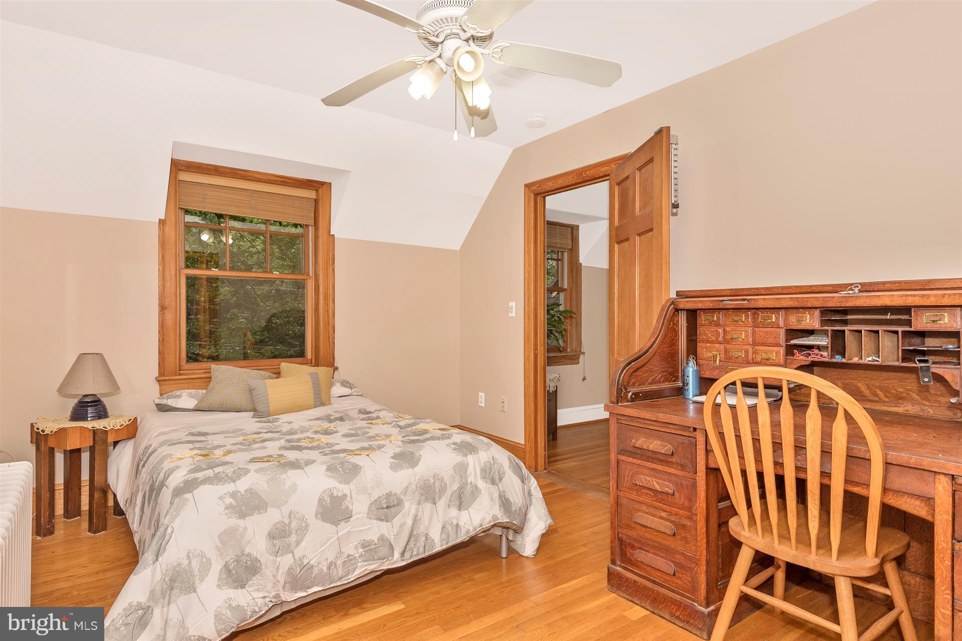 107 Sunnyside Road Silver Spring, MD 20910 - Photo 24 of 26 a bedroom with a bed and a window