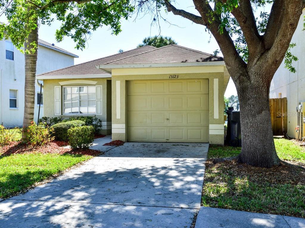 13123 Fennway Ridge Drive Riverview, FL 33579 - Photo 1 of 1 a front view of a house with a yard